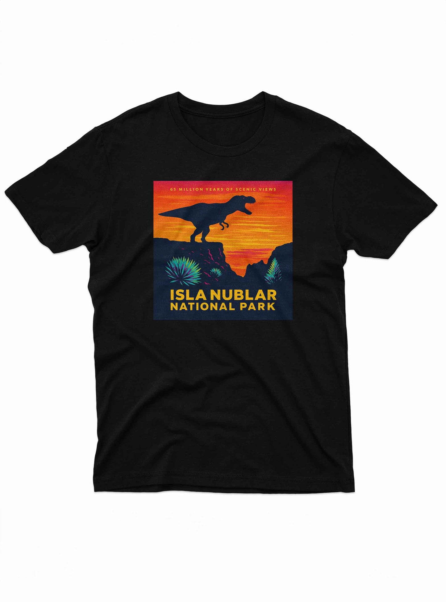 black t-shirt featuring a colorful vintage-style graphic of a t-rex silhouette standing on a cliff at sunset, with text that reads "isla nublar national park – 65 million years of scenic views", resembling a retro national park poster.