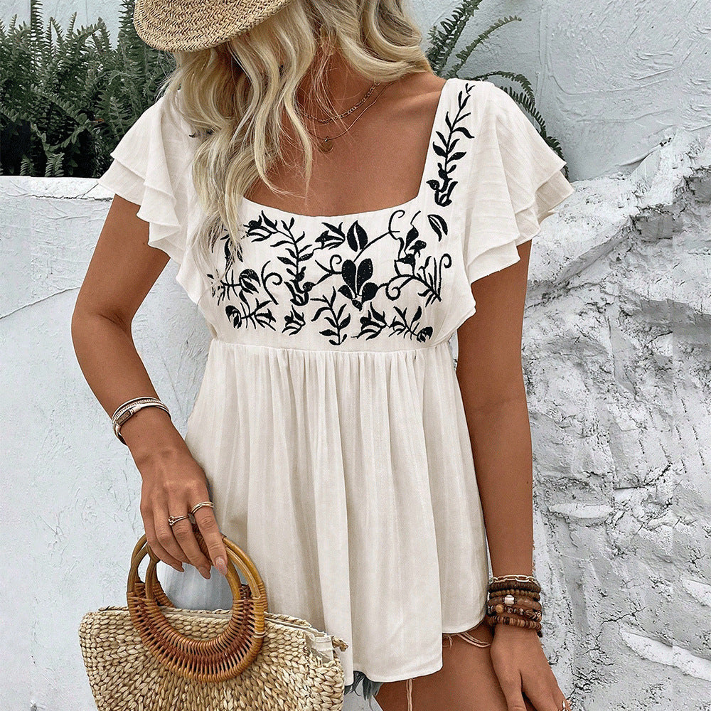 Women’s lace-trimmed square-neck embroidered blouse in apricot with black floral embroidery