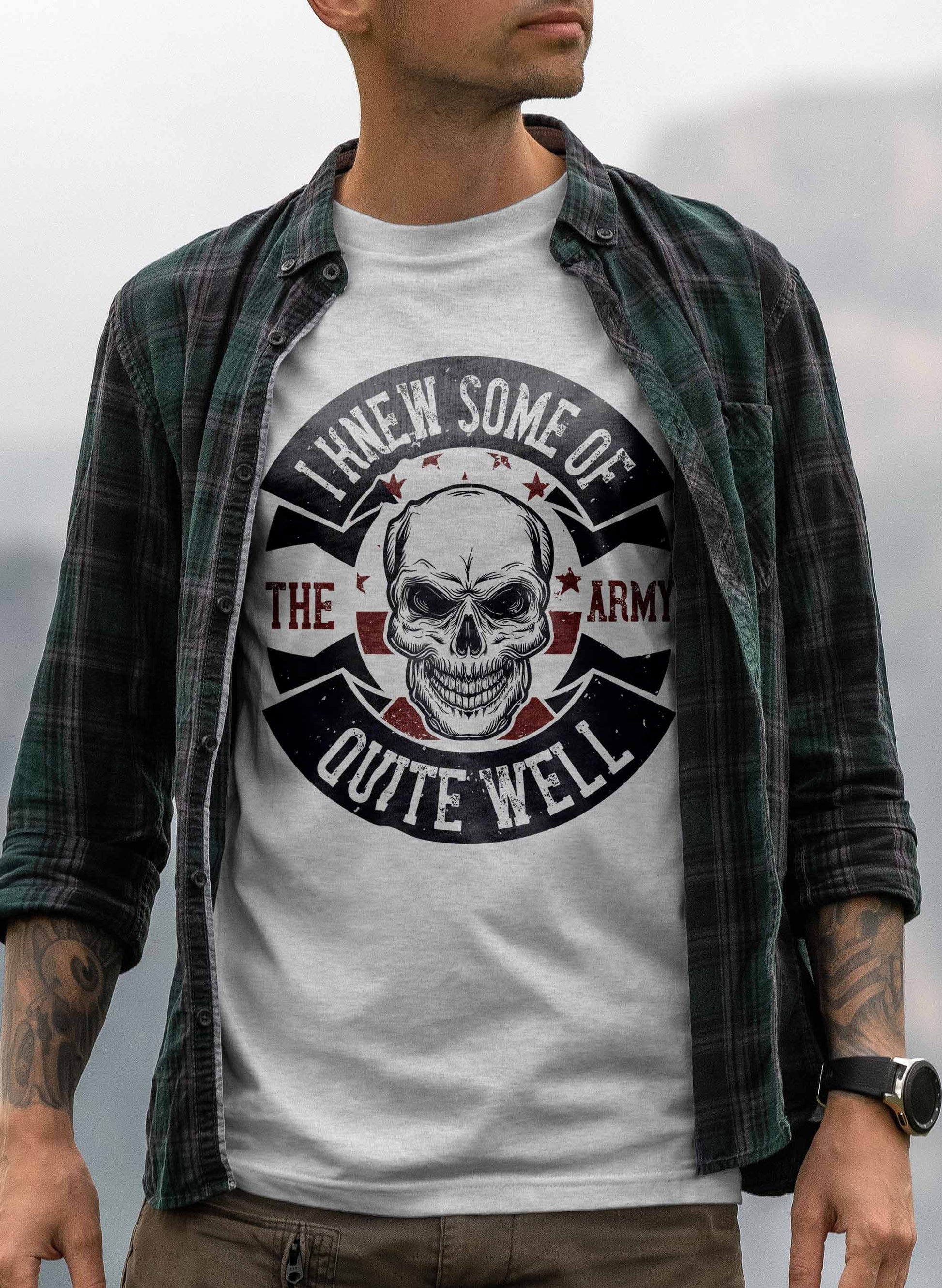 A t-shirt design that includes a large skull depicted in the center with a banner wrapping around it, containing the text "I Knew Some of The Army Quite Well" in bold letters. The design uses dark and reddish tones to create a stark, impactful look.