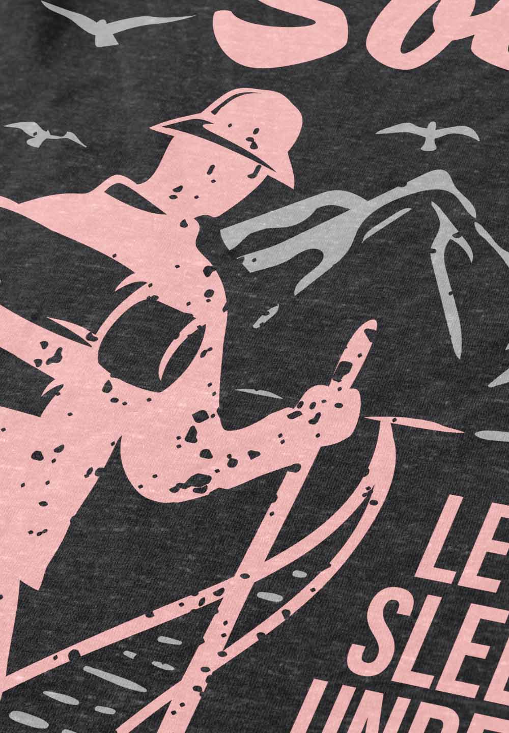 a dark-colored t-shirt displays a camping-themed design with a hiker looking towards a mountain range. key phrases such as "camping society" and "let's sleep under the stars" frame the image in large, appealing typography, encouraging a connection with nature and outdoor adventures.