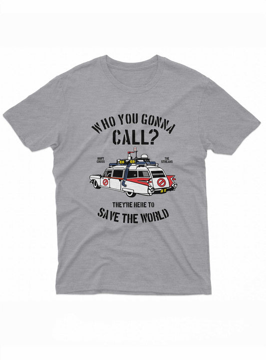 This image is of a grey t-shirt featuring an illustration of the Ecto-1 car from the Ghostbusters movie. Above the car, the text reads "Who You Gonna Call?", and below it says "They're Here to Save the World". The design also includes the Ghostbusters logo on the car doors.