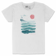 Women’s white T Shirt with ocean wave artwork, palm trees, pink sunset, and Good Vibes Come in Waves text.