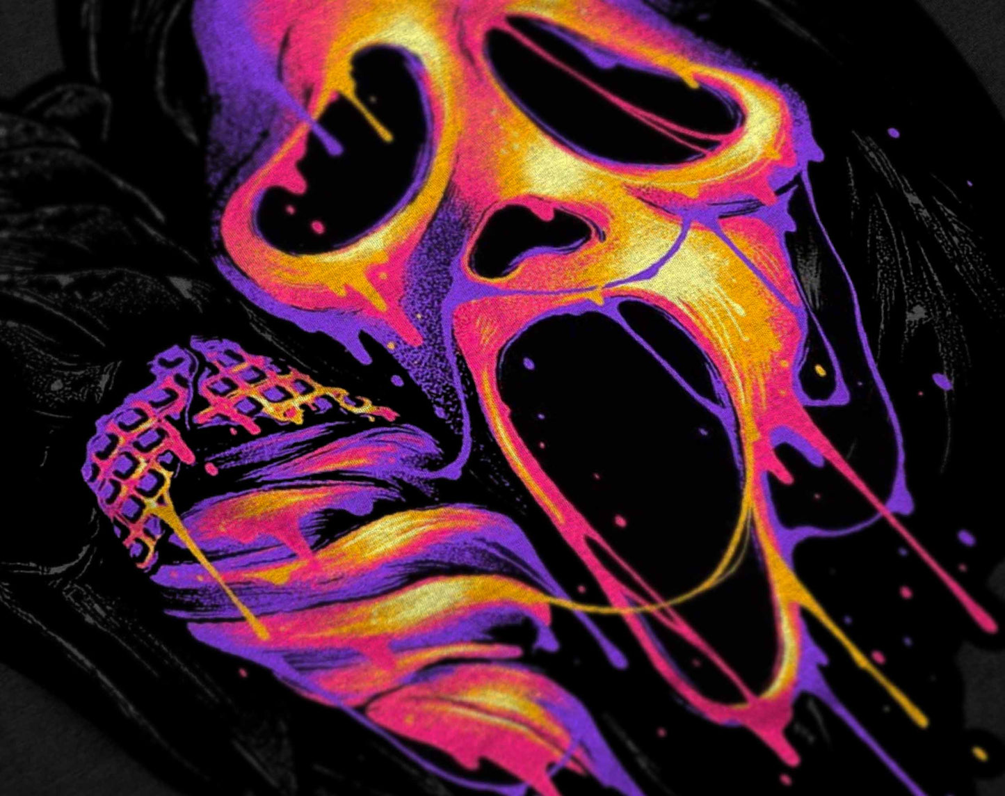 eye-catching horror movie tee featuring the iconic scream mask rendered in neon purple and yellow against a dark backdrop.