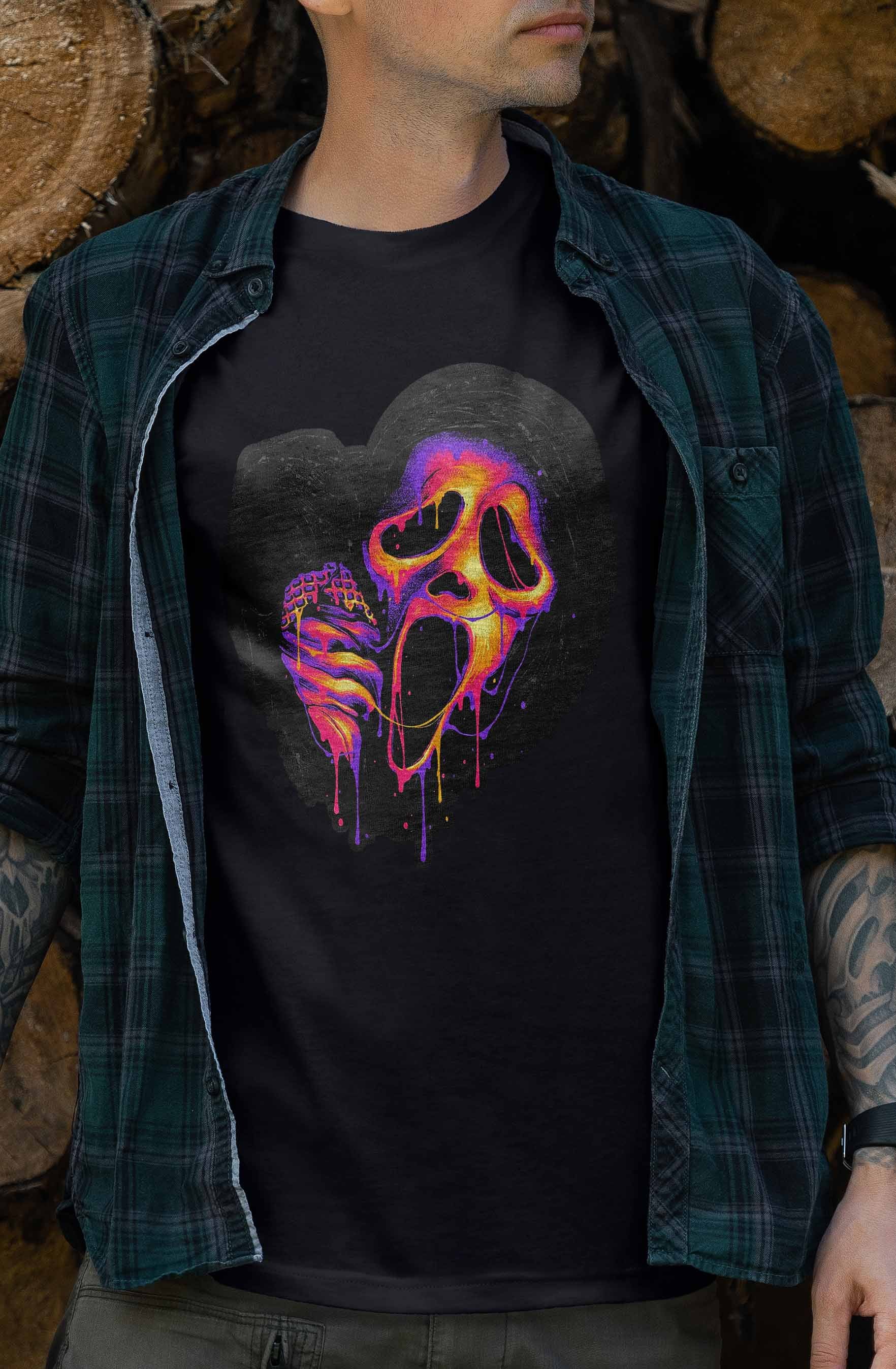 Halloween-themed T-shirt showcasing a Scream mask in a bright and bold neon color dripping downwards.