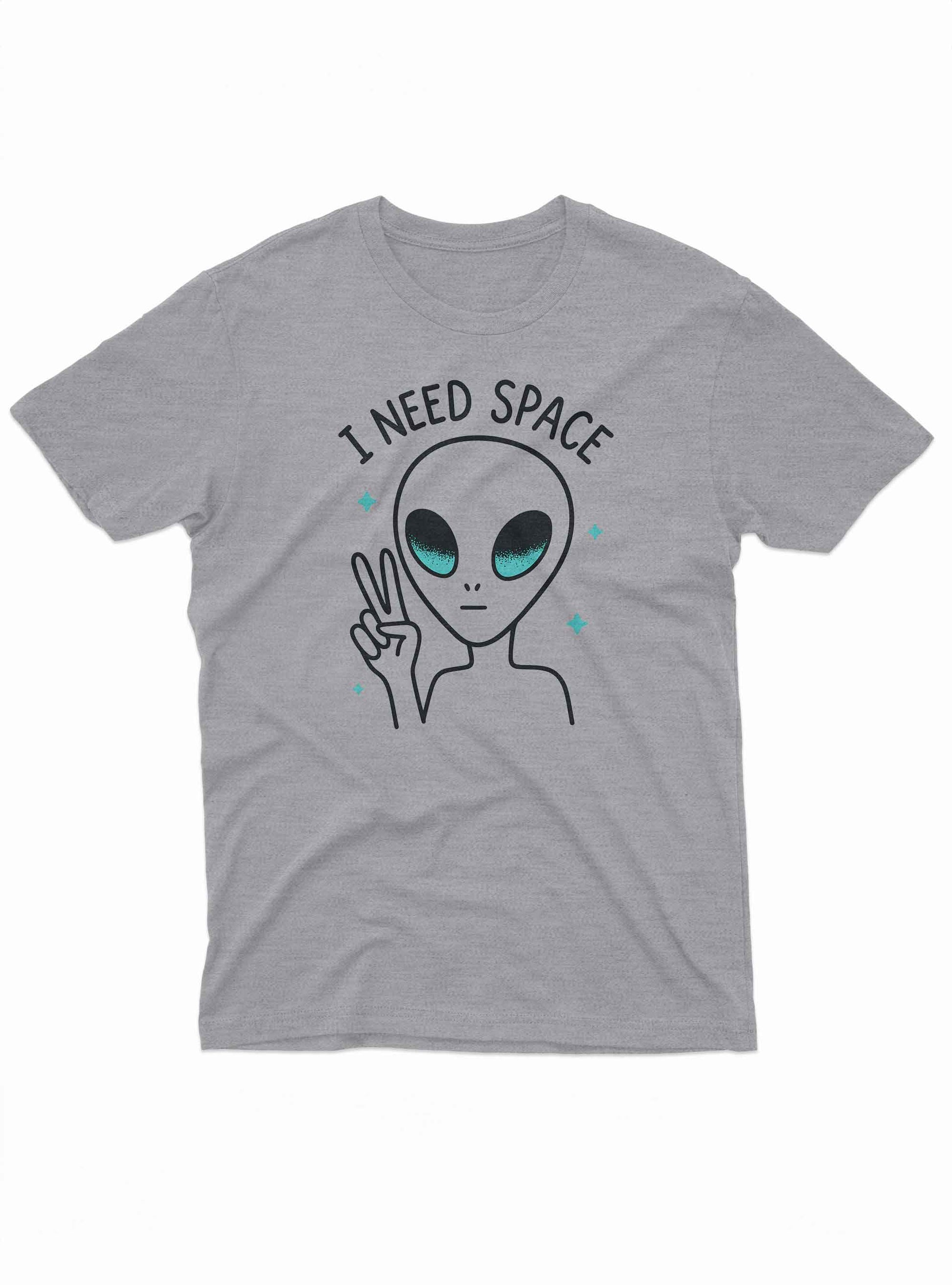 The alien has large black eyes with a teal shimmer and a small, round mouth.