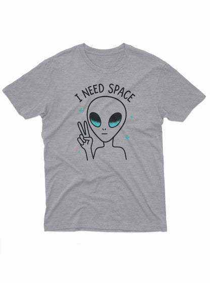 The alien has large black eyes with a teal shimmer and a small, round mouth.