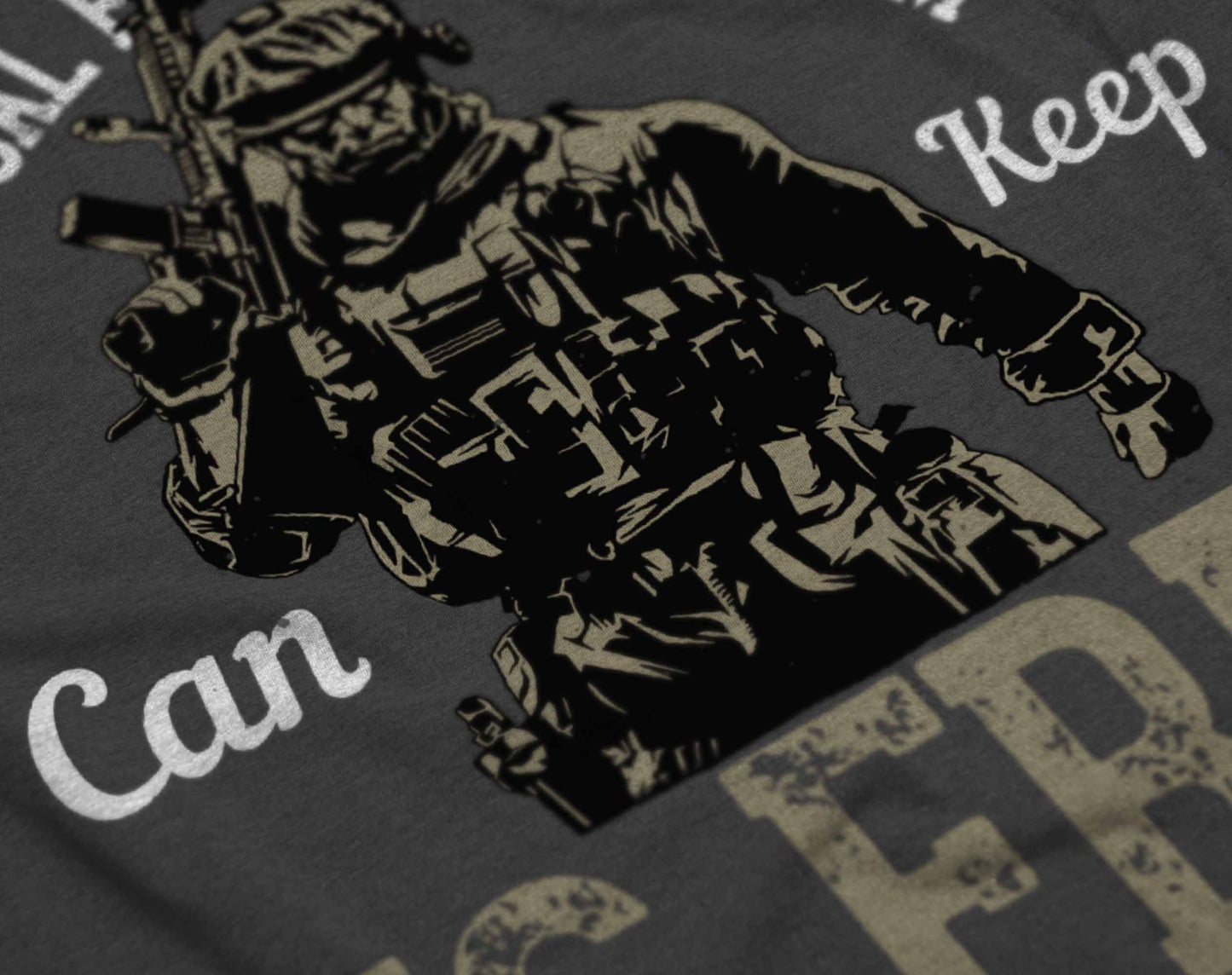 the graphic on this t-shirt includes a detailed illustration of a soldier, equipped and ready for duty, surrounded by the inspiring quote "only our individual faith in freedom can keep us free". the layout is designed to evoke a sense of duty and the crucial role of individual responsibility in safeguarding freedom.