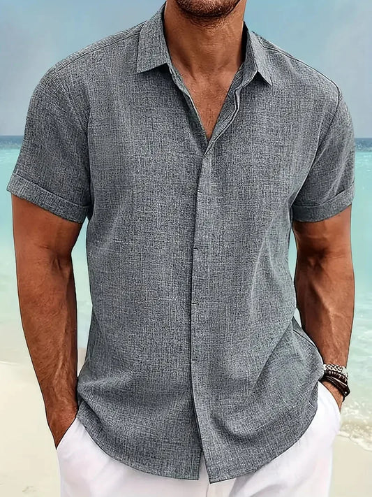 Men's casual gray linen short-sleeve shirt, buttoned up and styled for a summer day.