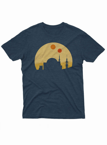 The shirt displays a minimalist Tatooine cityscape with two setting suns in retro colors.