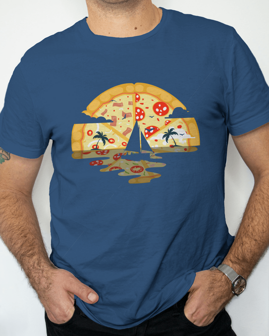 The t-shirt showcases a creative illustration where the segments of a pizza slice become parts of a beach scene. The cheese and toppings subtly transform into sand, while tomatoes turn into sunsets and pepperoni into palm trees, all set on a navy background.