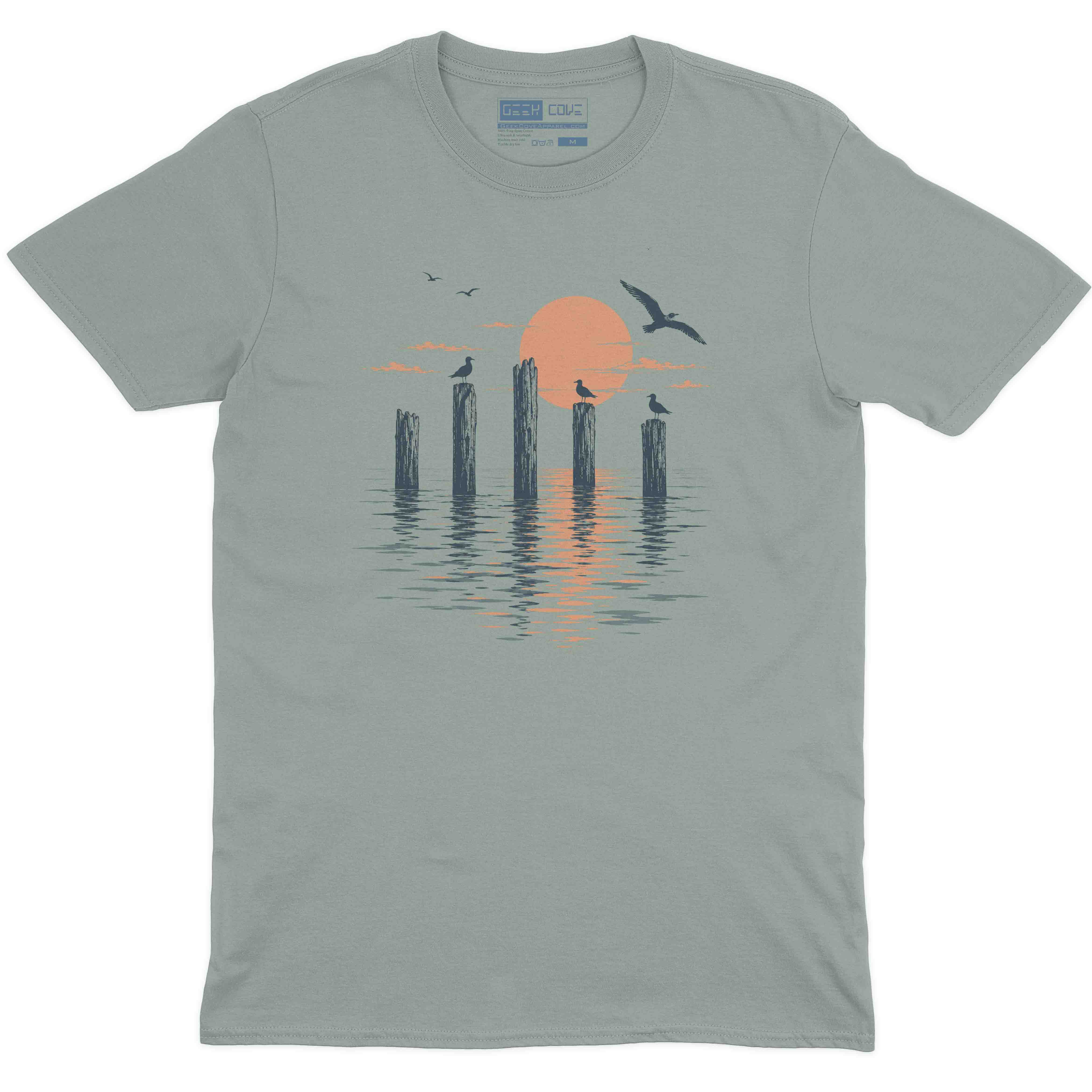 Vintage style beach T shirt with seagulls perched on pier posts over calm water