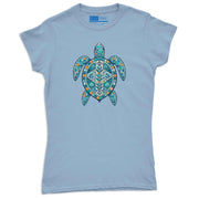Women’s pastel blue turtle graphic tee featuring artistic nautical mosaic artwork