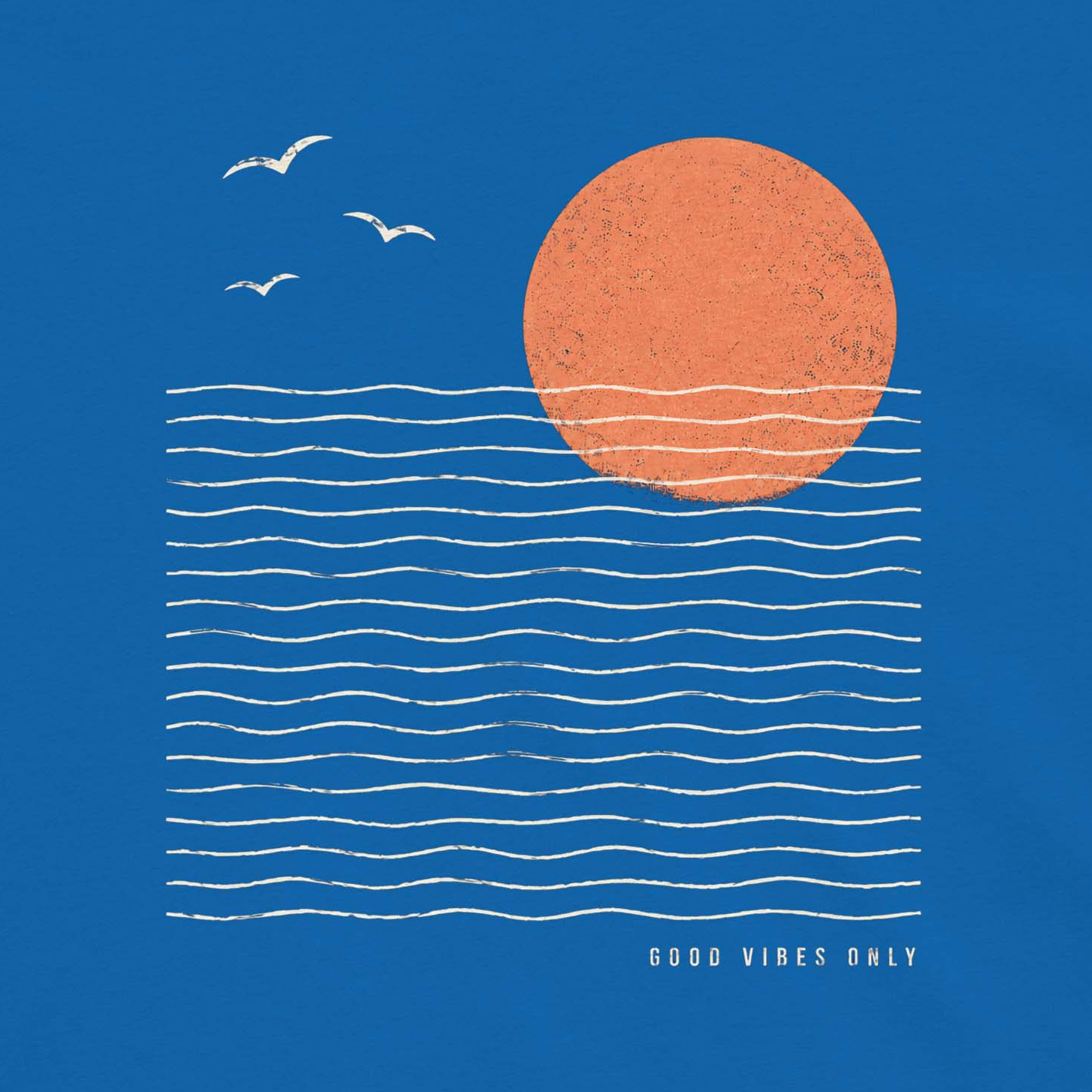 Blue women’s custom tee shirt with minimalist coastal sunset, ocean waves, and Good Vibes Only text