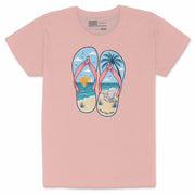 Women’s pink T Shirt with flip flop beach graphic featuring ocean, sunset, palm tree, and Good Vibes Only text