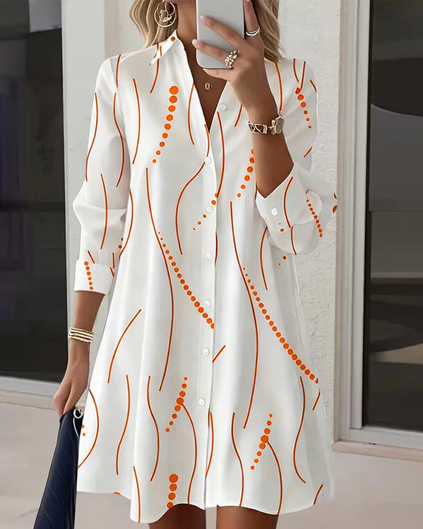 Women’s polka dot button-up shirt dress in white orange print, front view