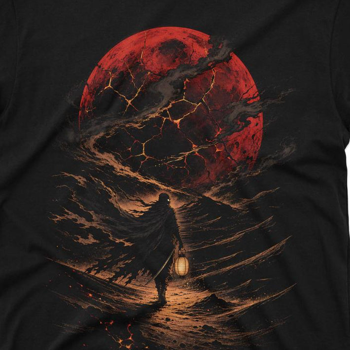 Obsidian Lantern Wanderer black tee close-up showing fractured crimson moon and glowing lantern bearer artwork